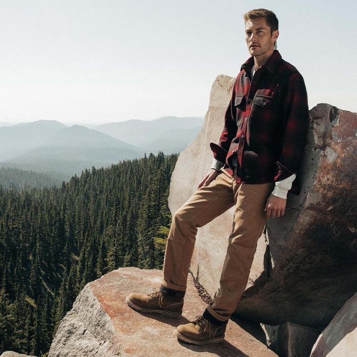 fit model posing in The Lined Chore Pant in Tobacco Boss Duck