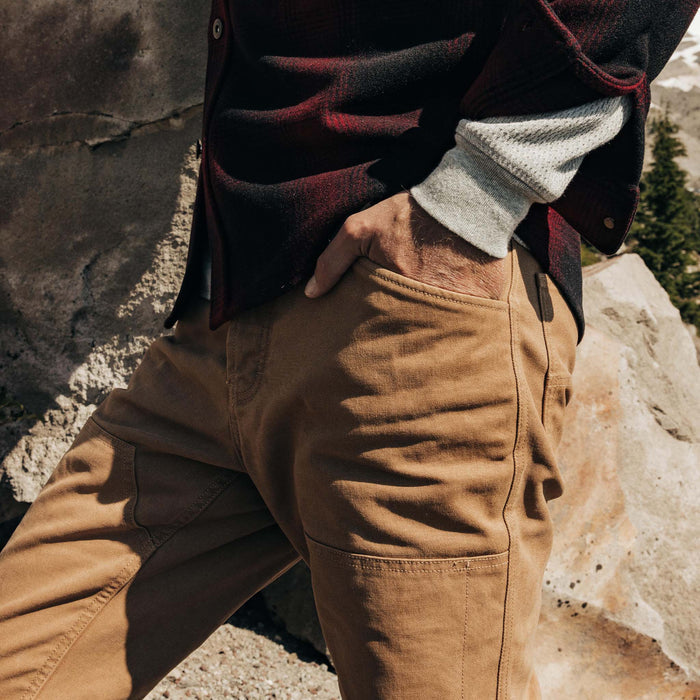 fit model with his hand in his pocket of The Lined Chore Pant in Tobacco Boss Duck