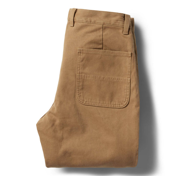 flatlay of the back of The Lined Chore Pant in Tobacco Boss Duck folded