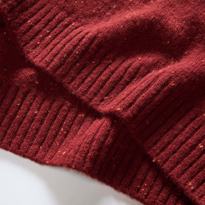 material shot of the hem on The Lodge Sweater in Bonfire Donegal