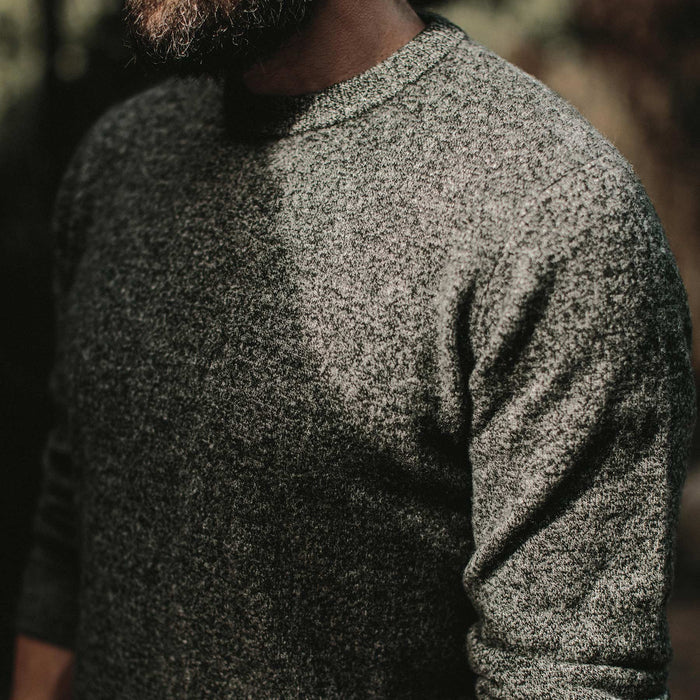 The fit model showing the detail of the lodge sweater