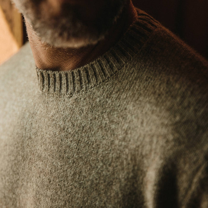 fit model wearing the lodge sweater, chest