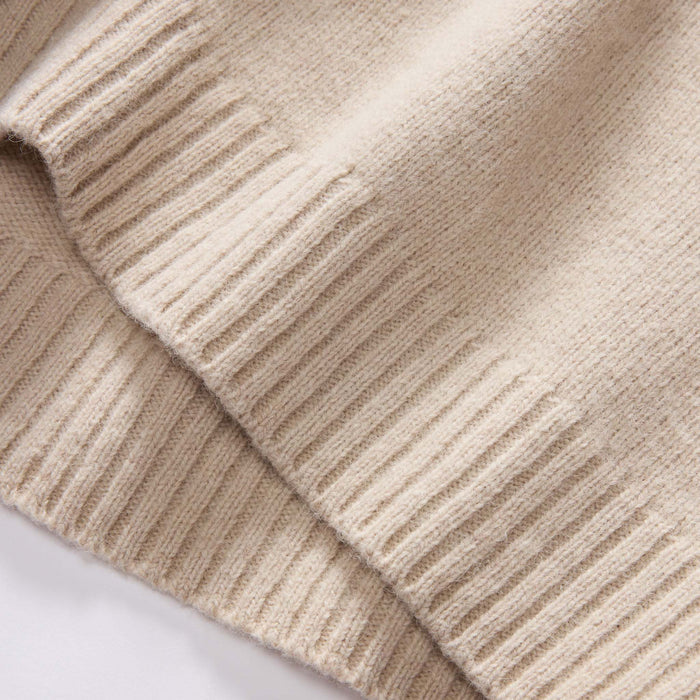 material shot of the ribbed hem on The Lodge Sweater in Oat