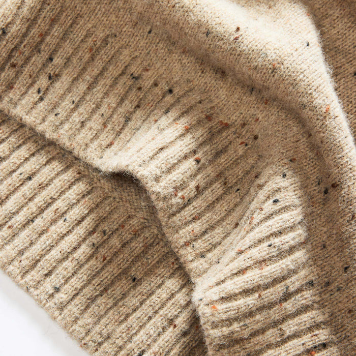 material shot of the bottom hem on The Lodge Sweater in Sand Donegal