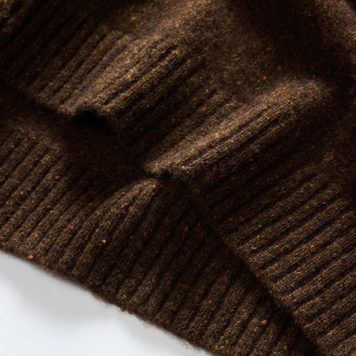 material shot of the hem on The Lodge Sweater in Timber Donegal