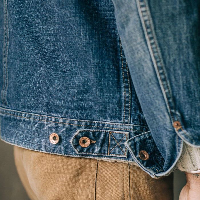 fit model wearing The Long Haul Jacket in 18 Month Wash Organic Selvage, button details
