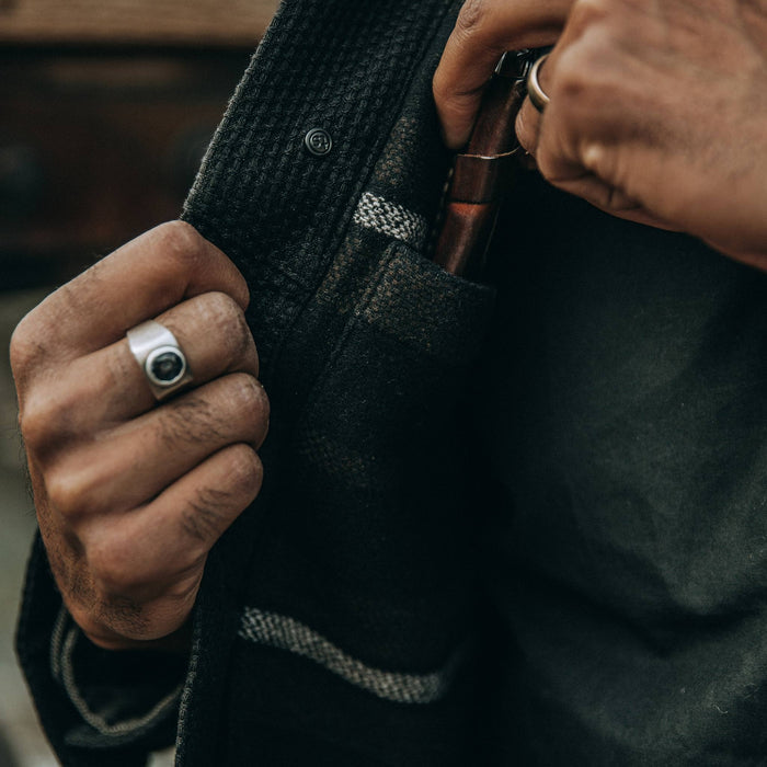 fit model wearing The Long Haul Jacket in Black Indigo Sashiko—interior shot