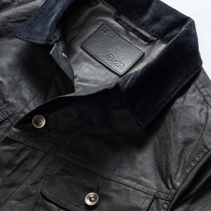 material shot of the collar on The Long Haul Jacket in Coal Waxed Canvas