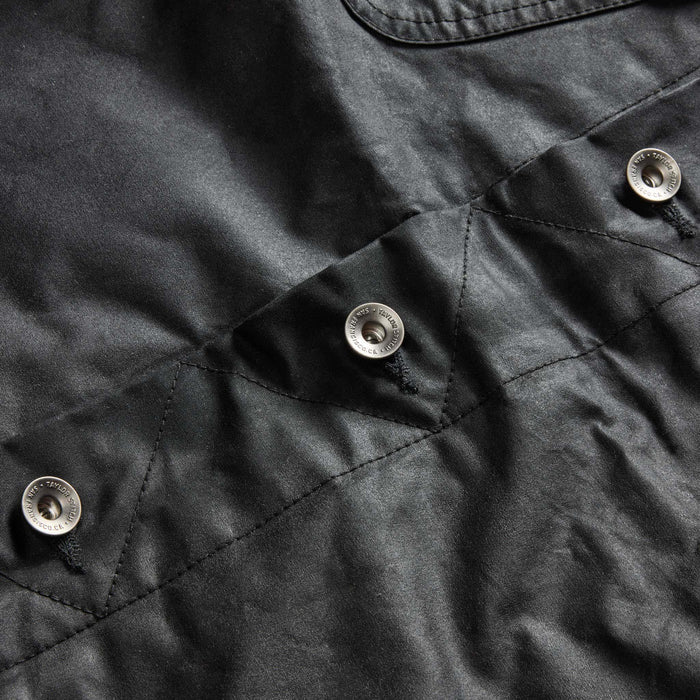 material shot of the buttons on The Long Haul Jacket in Coal Waxed Canvas