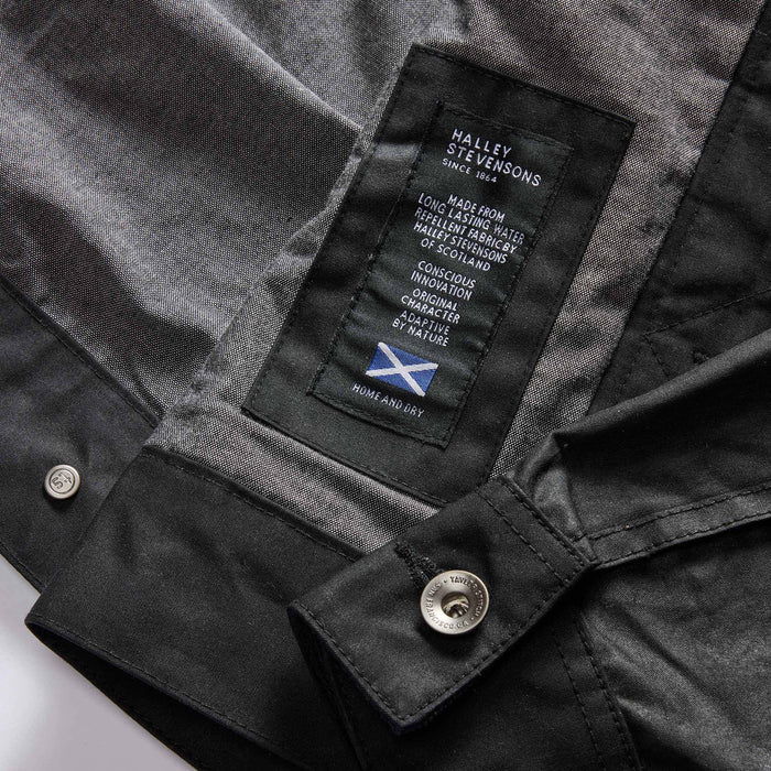 material shot of the Halley Stevensons label on The Long Haul Jacket in Coal Waxed Canvas