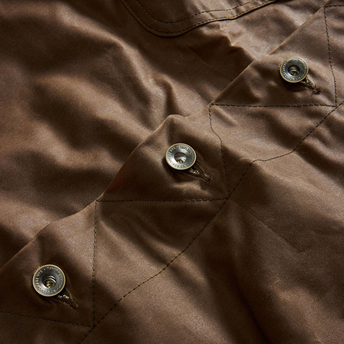 material shot of the buttons on The Long Haul Jacket in Dark Khaki Waxed Canvas