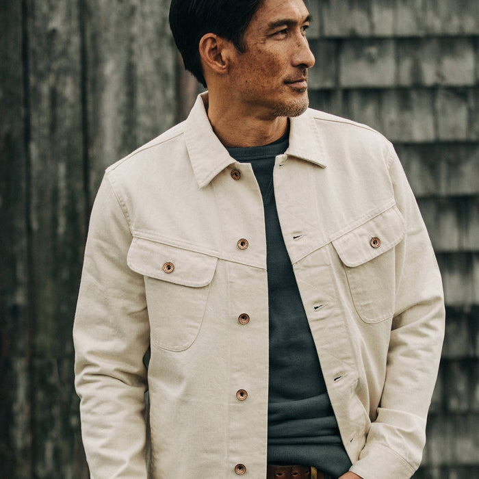 fit model wearing The Long Haul Jacket in Natural Organic Selvage, looking right