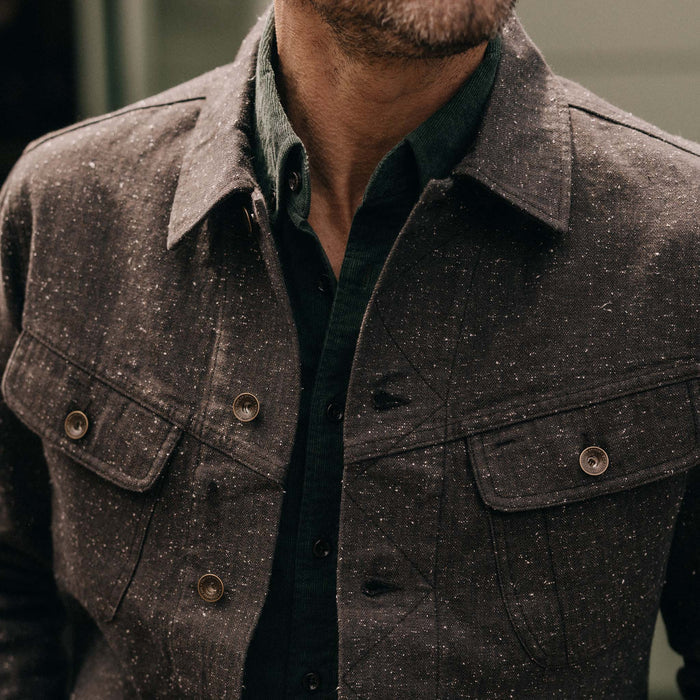 fit model showing off the front of The Long Haul Jacket in Peat Nep Herringbone