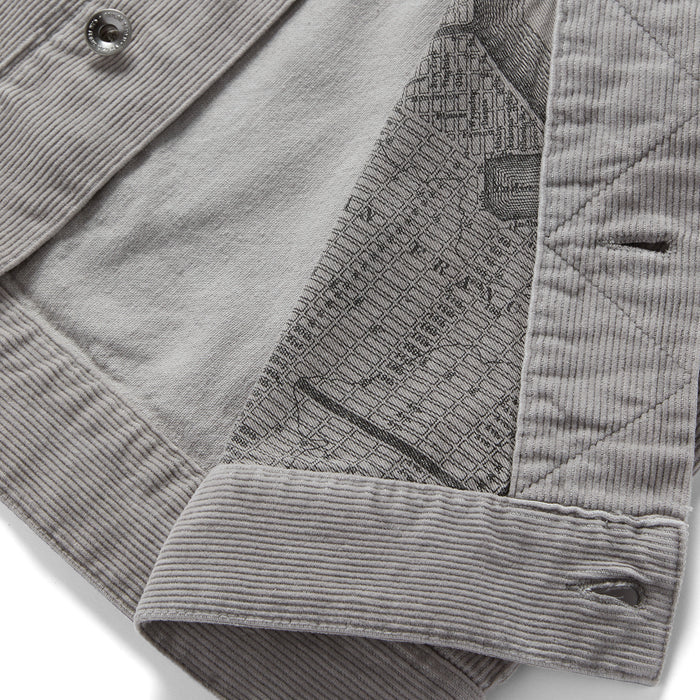 material shot of the map print lining on The Long Haul Jacket in Steeple Grey Cord