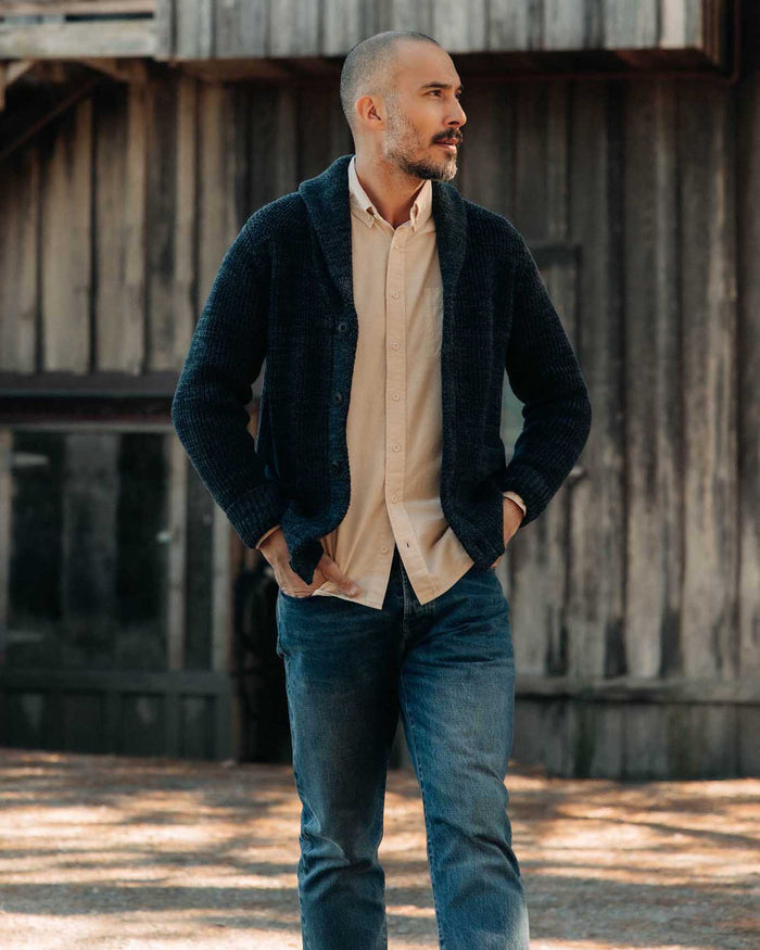 fit model walking wearing The Mariner Shawl Cardigan in Ink Slub