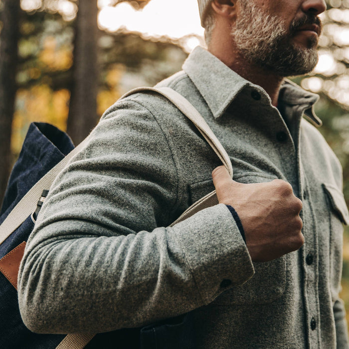fit model wearing The Maritime Shirt Jacket in Ash Donegal, holding tote