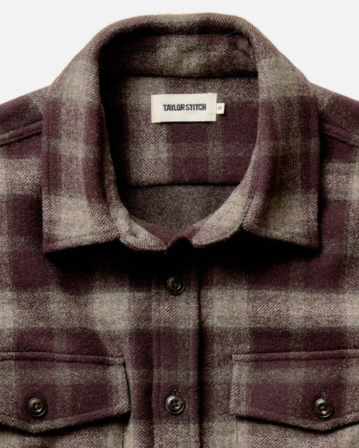 fit model showing the cuffs on The Maritime Shirt Jacket in Burgundy Plaid