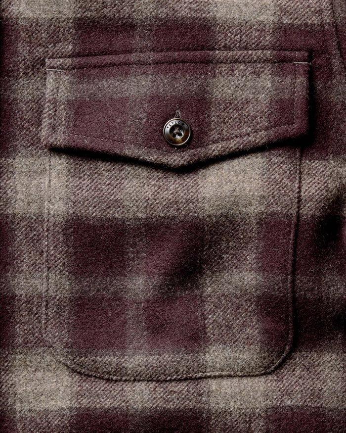 material shot of the front chest pockets on The Maritime Shirt Jacket in Burgundy Plaid