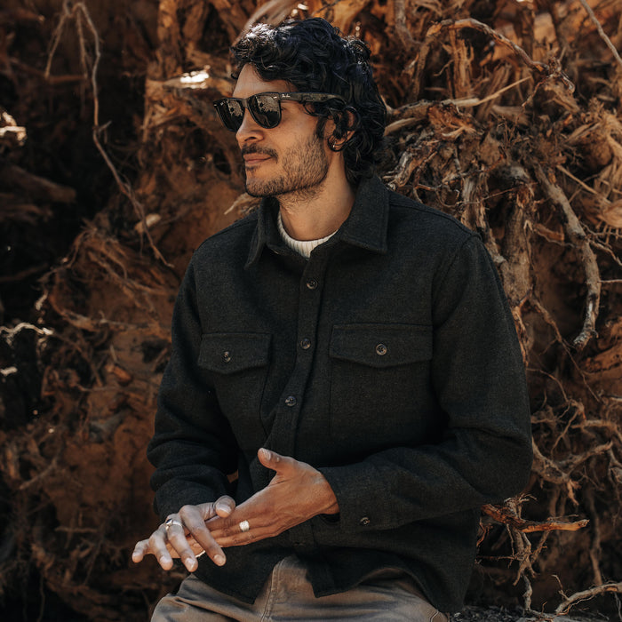 fit model posing by a tree in The Maritime Shirt Jacket in Evergreen Twill