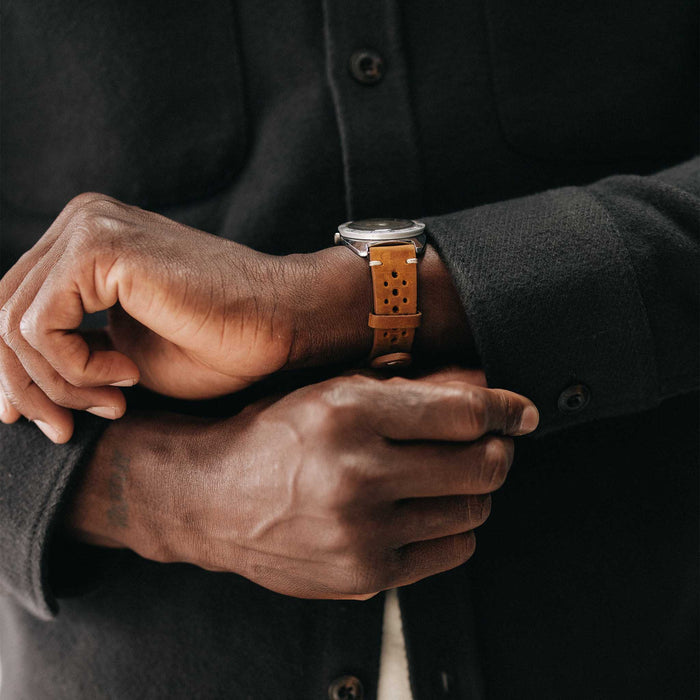 fit model adjusting the cuffs on The Maritime Shirt Jacket in Faded Black Moleskin Twill