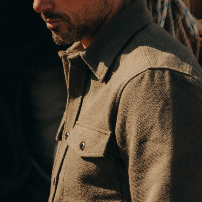 fit model showing off the sleeves on The Maritime Shirt Jacket in Fatigue Olive Moleskin Twill