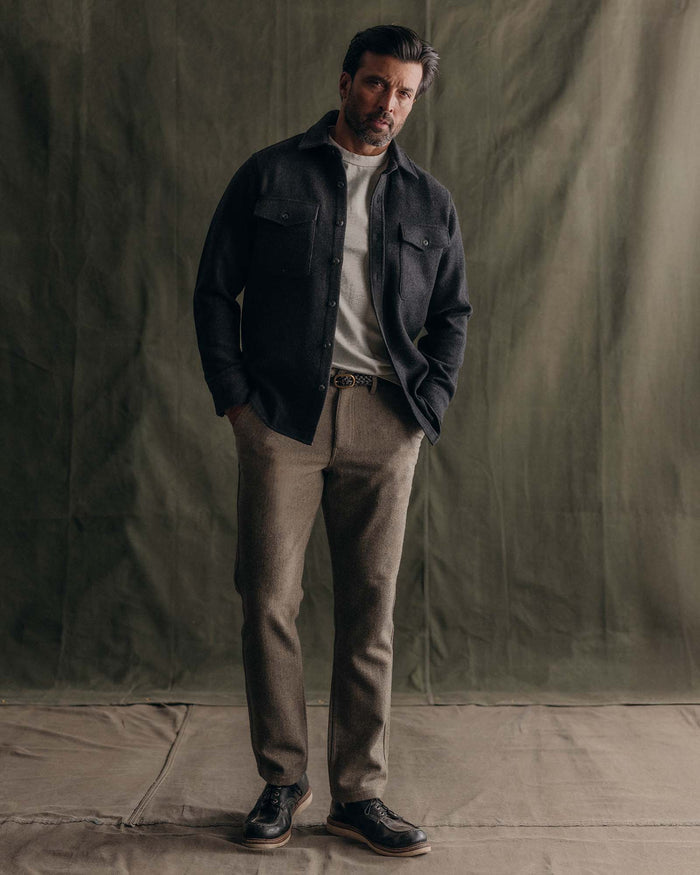 fit model standing wearing The Maritime Shirt Jacket in Heather Charcoal Wool