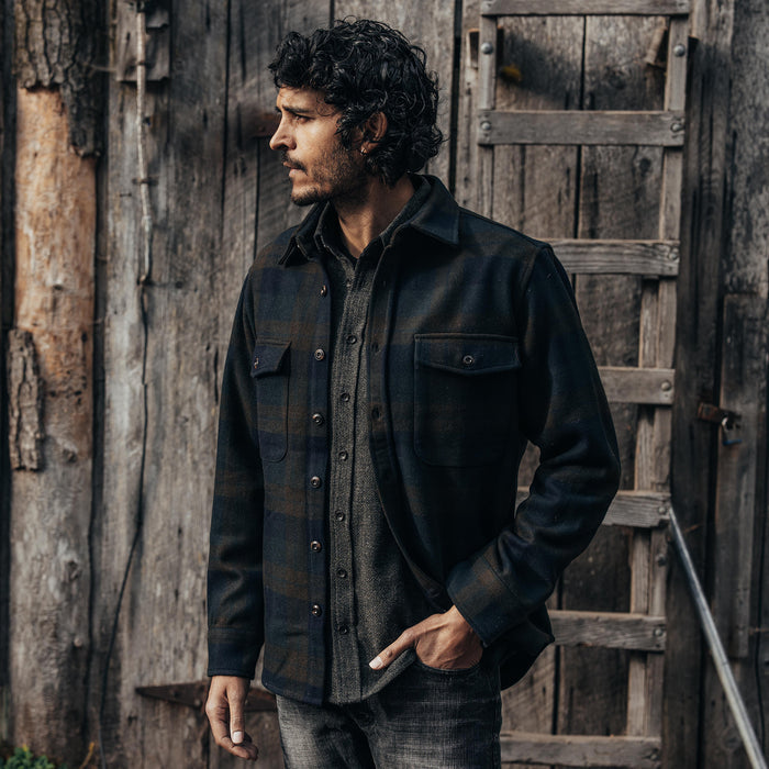 fit model with his hand in his pocket wearing The Maritime Shirt Jacket in Pike Plaid