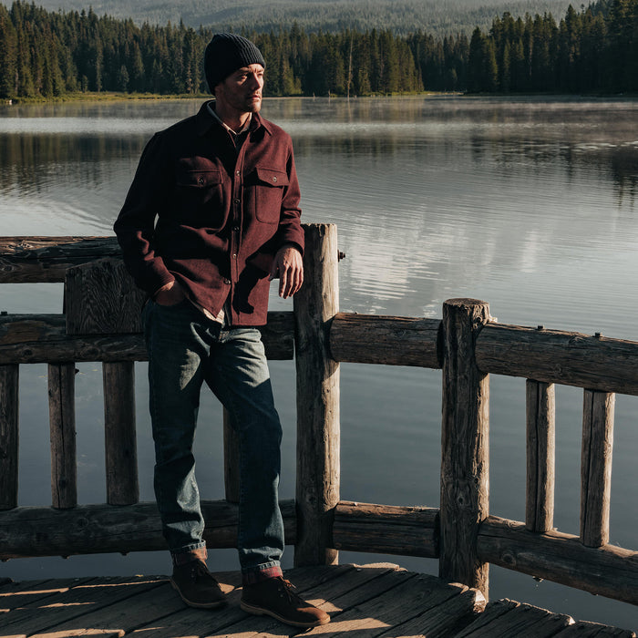 fit model posing by the water in The Maritime Shirt Jacket in Port Twill
