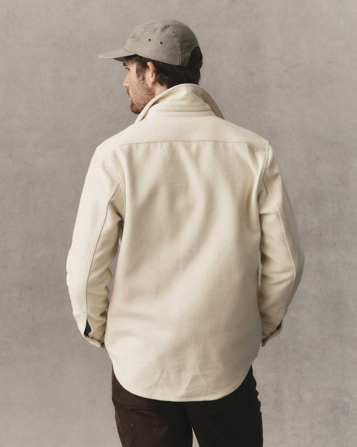 fit model showing off the back of The Maritime Shirt Jacket in Vintage White Moleskin Twill
