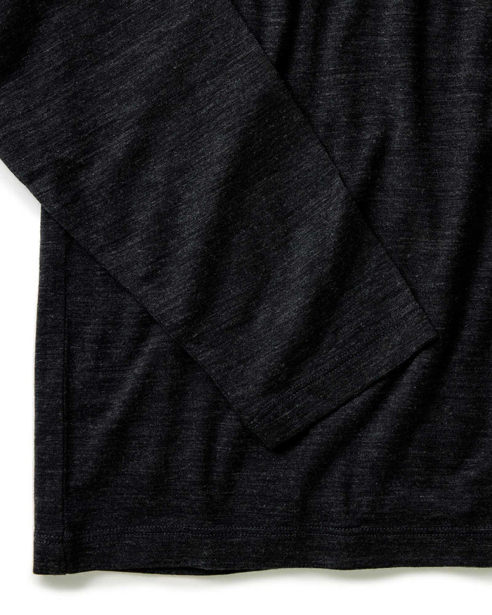 material shot of the sleeves on The Merino Long Sleeve Tee in Heather Black