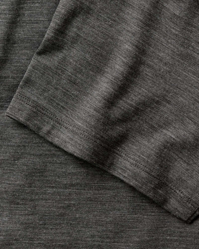 material shot of the sleeve on The Merino Polo in Heather Army