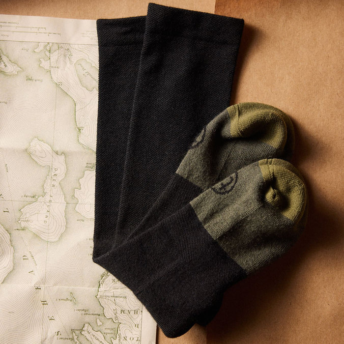 flatlay of The Merino Sock in Black folded