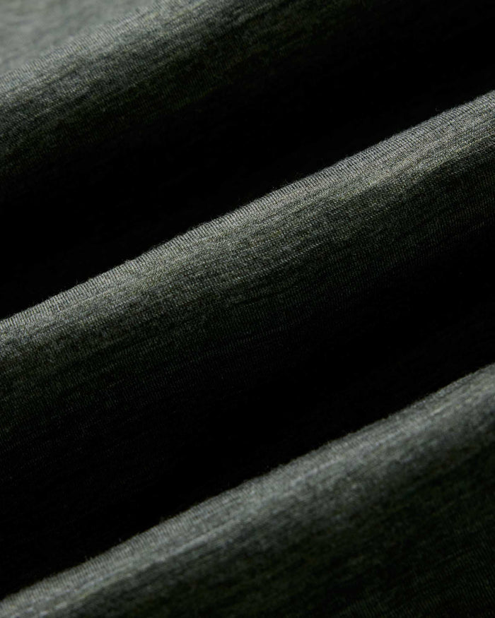 material shot of the sleeve on The Merino Tee in Heather Army