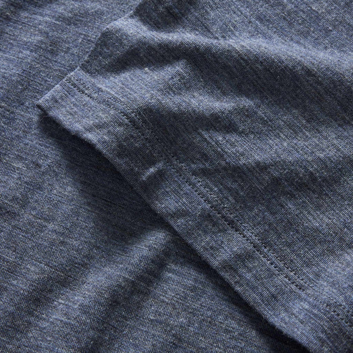 material shot of the sleeve on The Merino Tee in Heather Navy