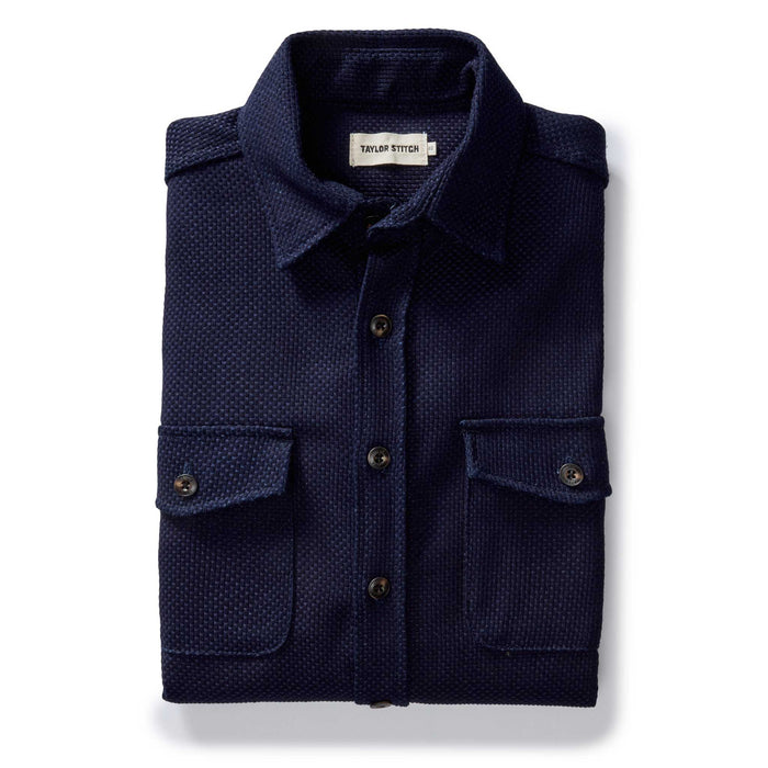 flatlay of the The Mill Shirt Jacket in Rigid Indigo Sashiko folded