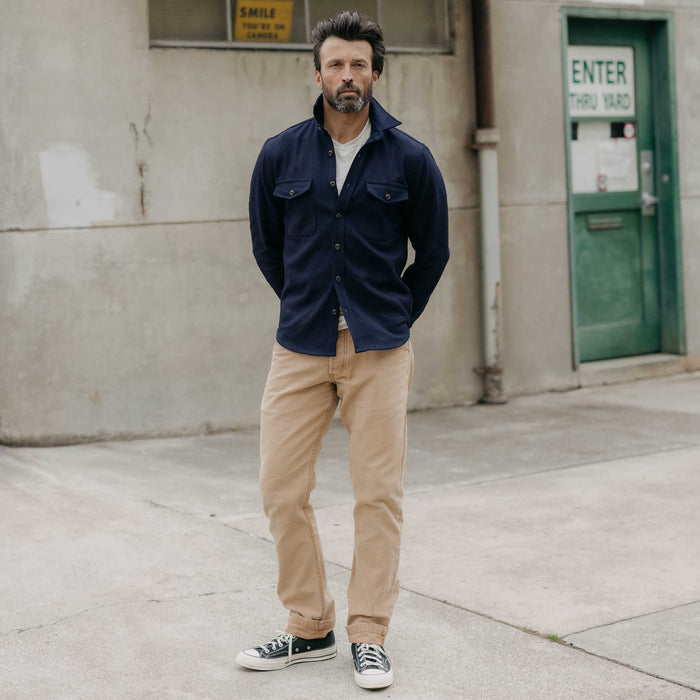 fit model posing wearing The Mill Shirt Jacket in Rigid Indigo Sashiko