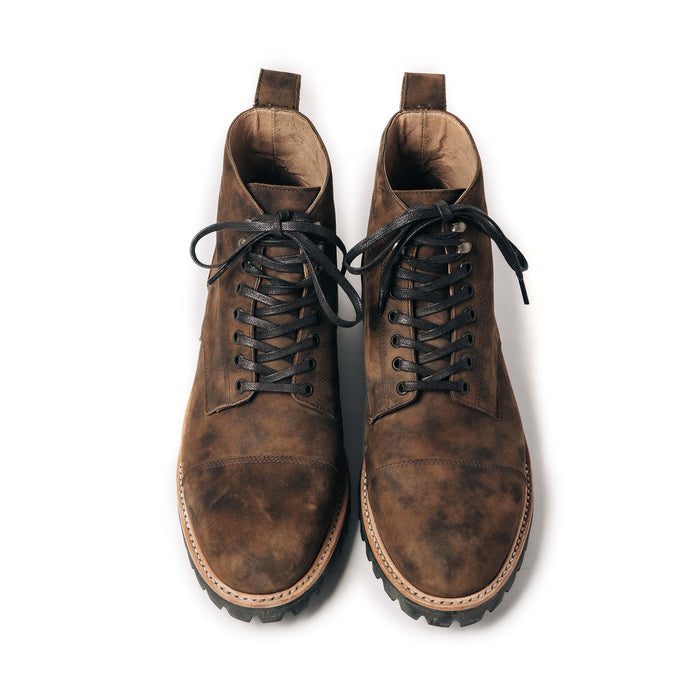 material shot of the front of The Moto Boot in Espresso Grizzly