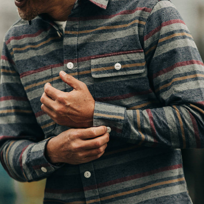 fit model rocking The Moto Shirt in Blanket Stripe, fixing sleeve