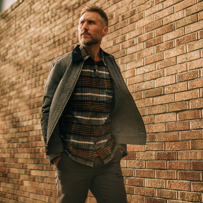 fit model wearing The Moto Shirt in Orange Plaid under our Ignition jacket