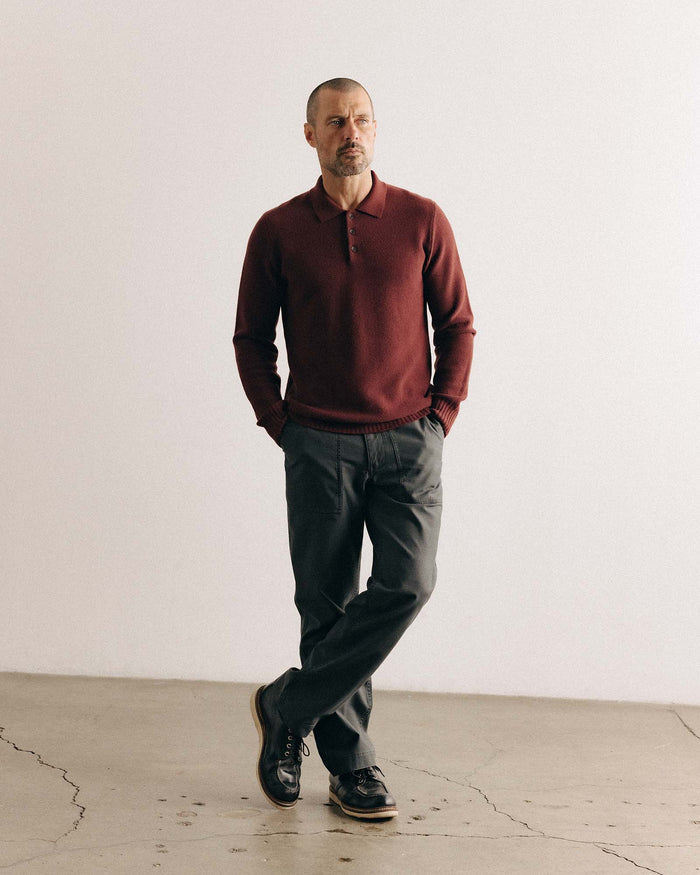 fit model showing off The Newton Sweater Polo in Dried Cherry Merino