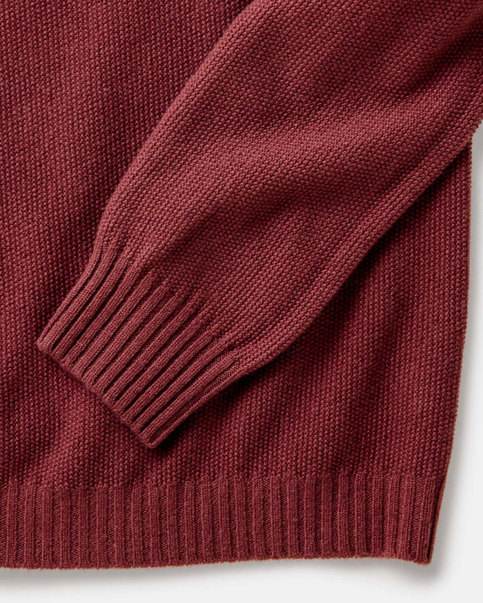 material shot of the sleeves on The Newton Sweater Polo in Dried Cherry Merino