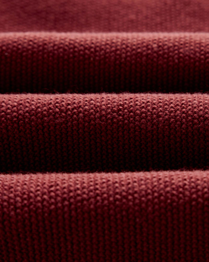 material shot of the fabric on The Newton Sweater Polo in Dried Cherry Merino
