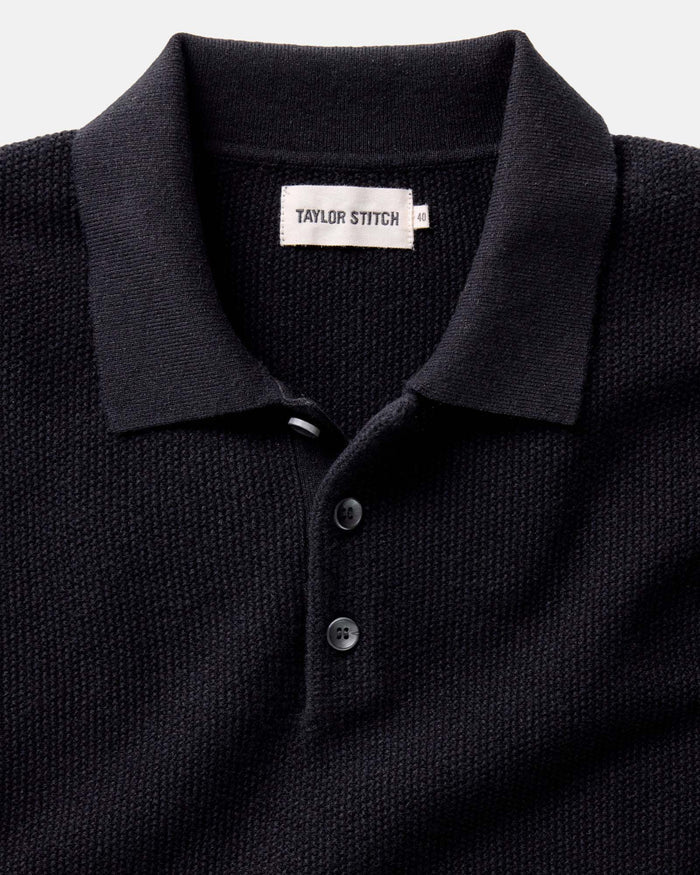 material shot of the collar on The Newton Sweater Polo in Midnight Merino
