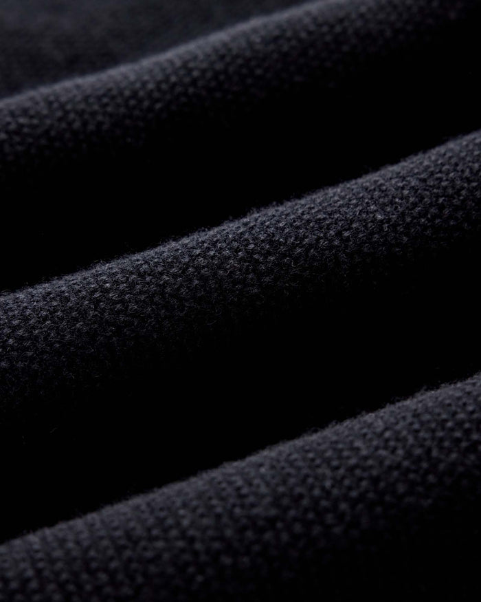 material shot of the fabric on The Newton Sweater Polo in Midnight Merino