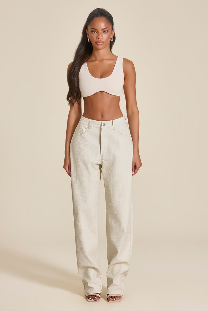 The Nyra Faux Leather Trousers in Off White