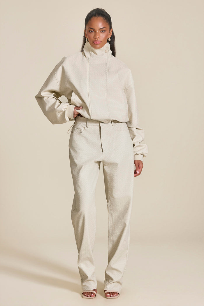 The Nyra Faux Leather Trousers in Off White