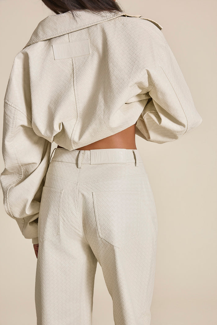 The Nyra Faux Leather Trousers in Off White
