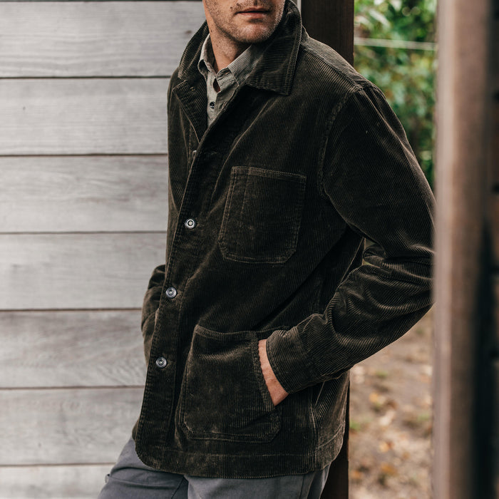 fit model with his hands in his pockets wearing The Ojai Jacket in Army Cord