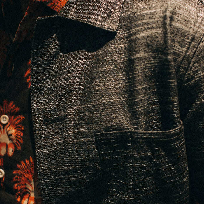 fit model wearing The Ojai Jacket in Black Cross Dye, chest detail