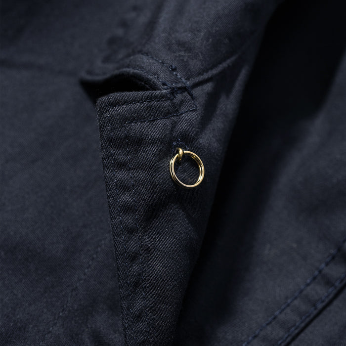 material shot of the interior button on The Ojai Jacket in Indigo